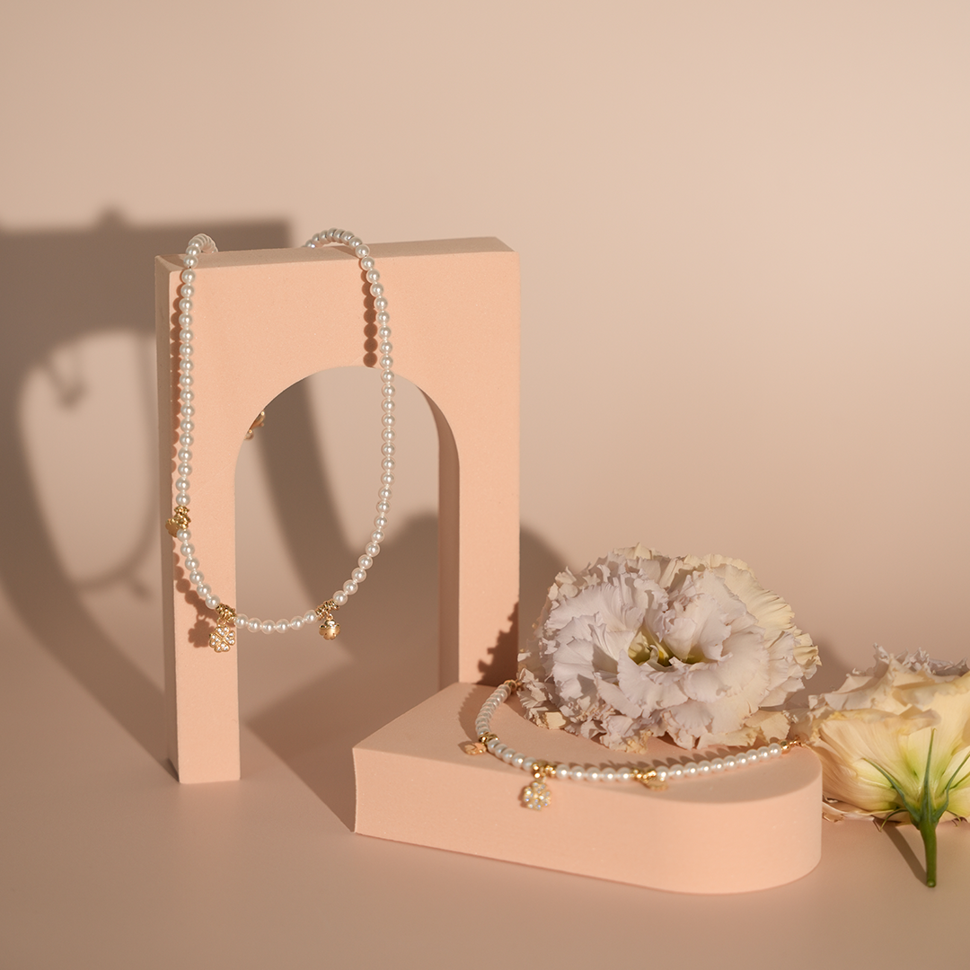 Set perla collana e bracciale quadrifoglio